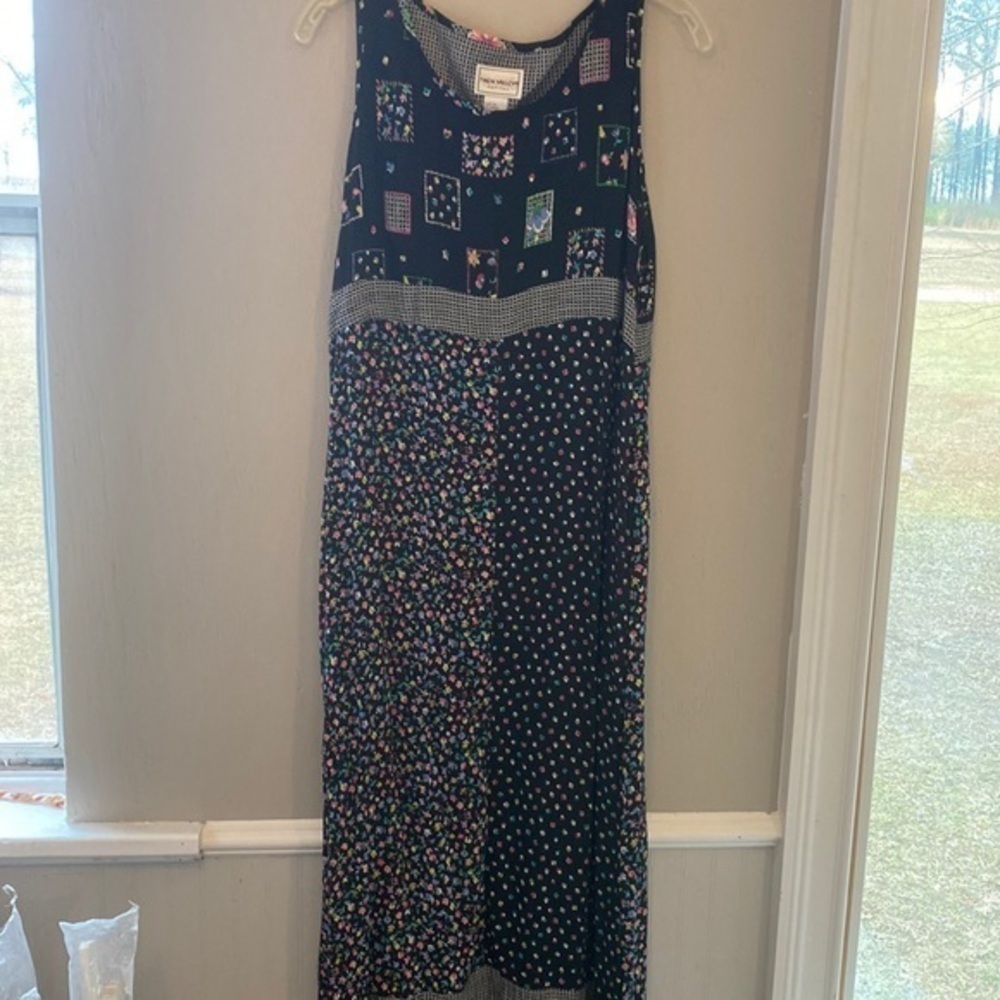 Very cute‎ dress. Size small it’s long